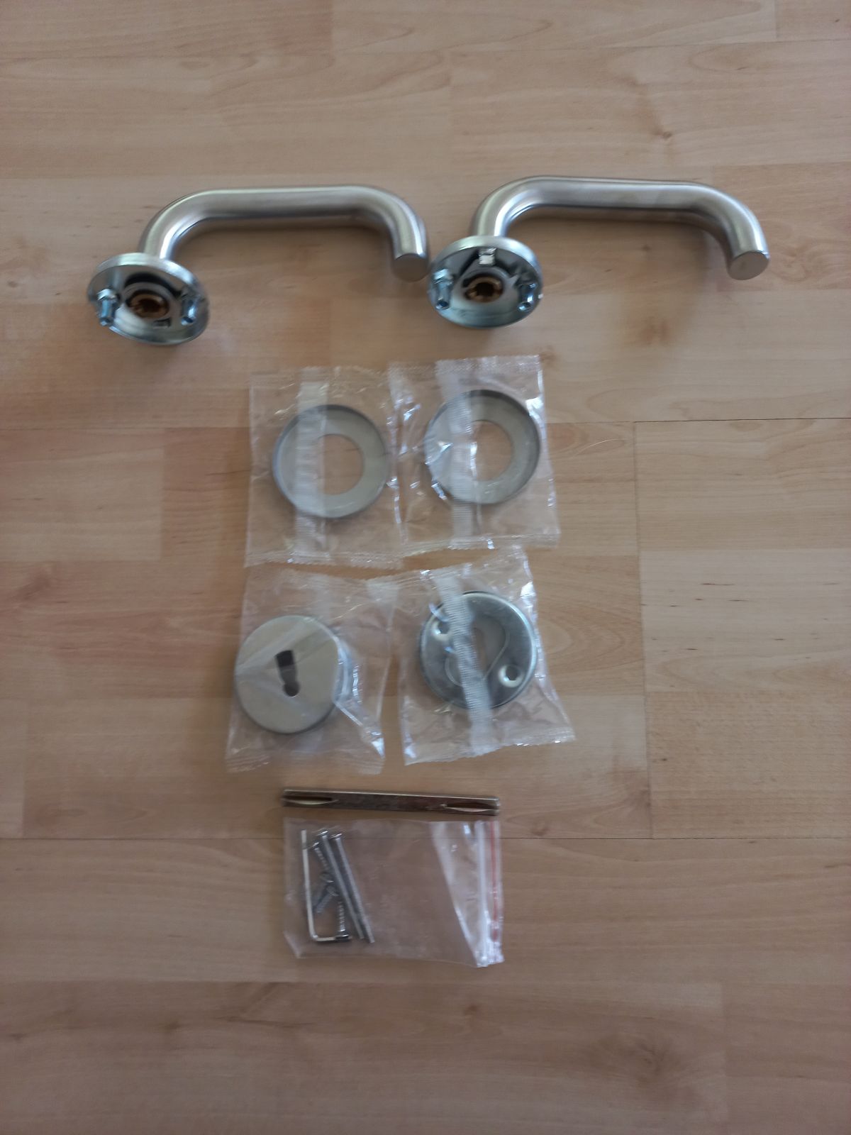 Stainless steel door handle + key hole